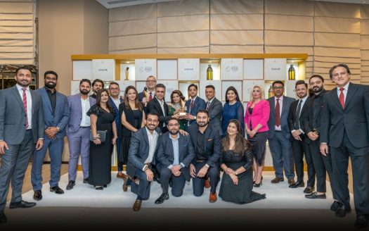 Real estate professionals from Homes 4 Life collaborating with Emaar, a renowned property developer